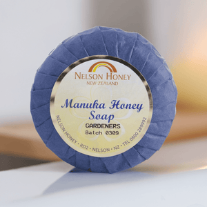 Nelsons Honey round wrapped bar labelled manuka honey gardeners soap in blue paper for hardworking hands