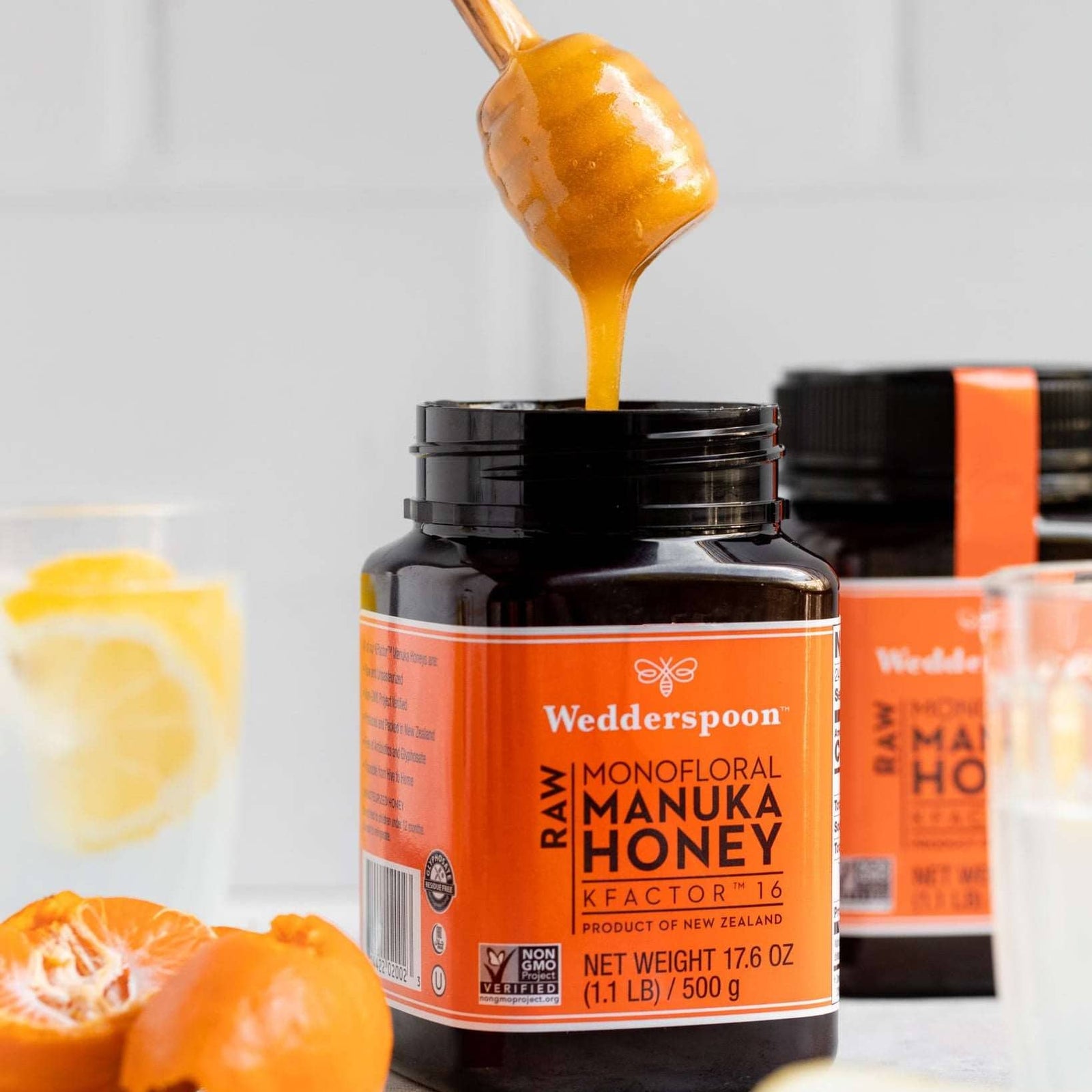 Wedderspoon Raw Manuka honey KFactor 16 500g jar with orange label and black lid