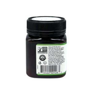 Wedderspoon Organic Raw Manuka Honey 400 MGO 250g jar with label showing product details and certification