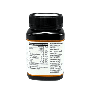 Jar of Wedderspoon Raw Manuka Honey 400 MGO 500g showing nutrition and manufacturing details