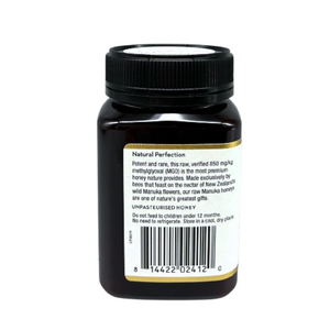 Wedderspoon Raw Manuka honey 850 MGO 500g dark brown jar with black lid showing back label and barcode