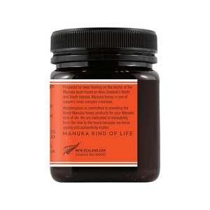Wedderspoon Raw Manuka Honey 250g jar with black lid and orange label showing product information