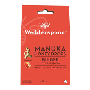 Wedderspoon manuka honey ginger drops throat lozenges in red packaging with ginger and honey images