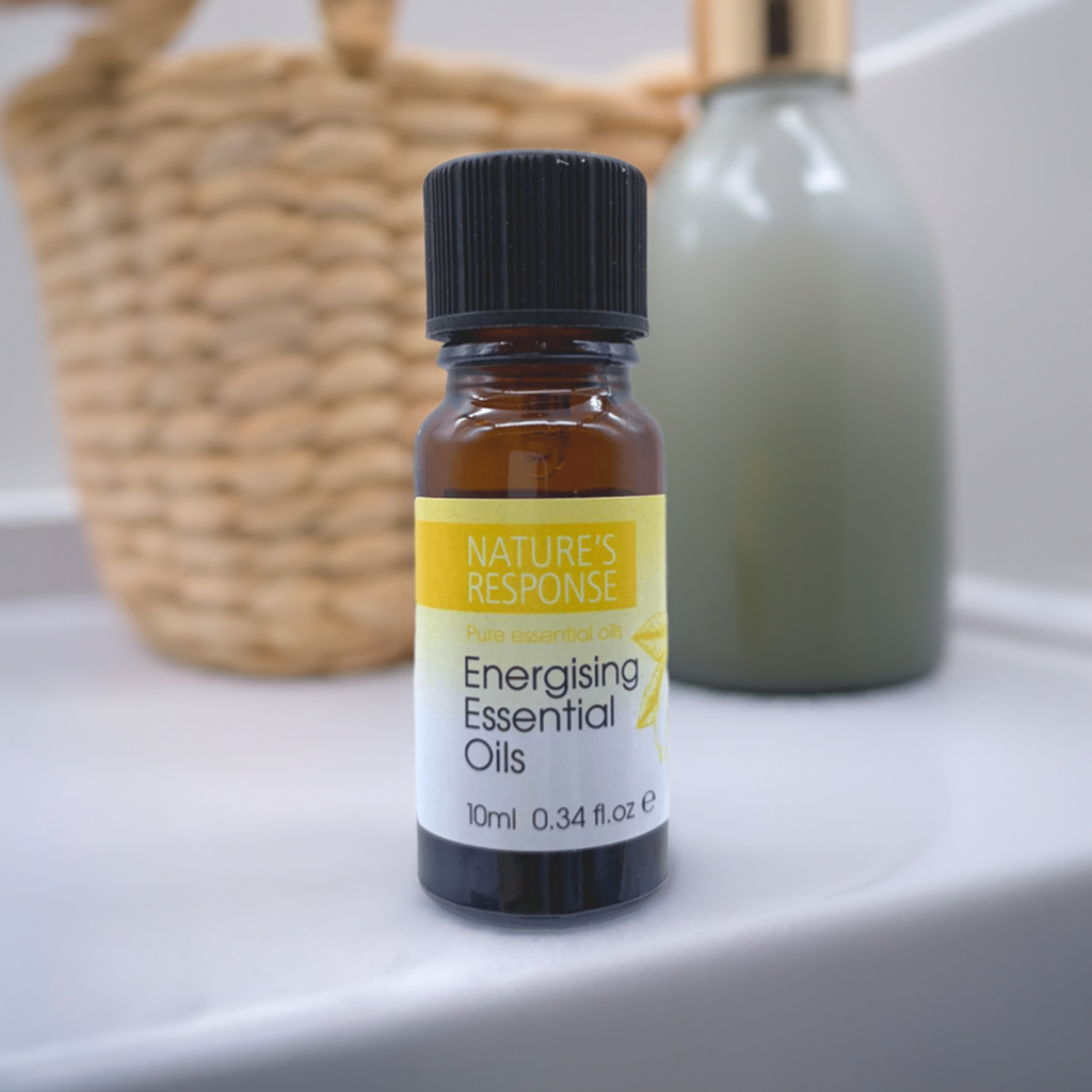 Natures Response tea tree essential oil 10ml amber glass bottle on bathroom sink with wicker basket