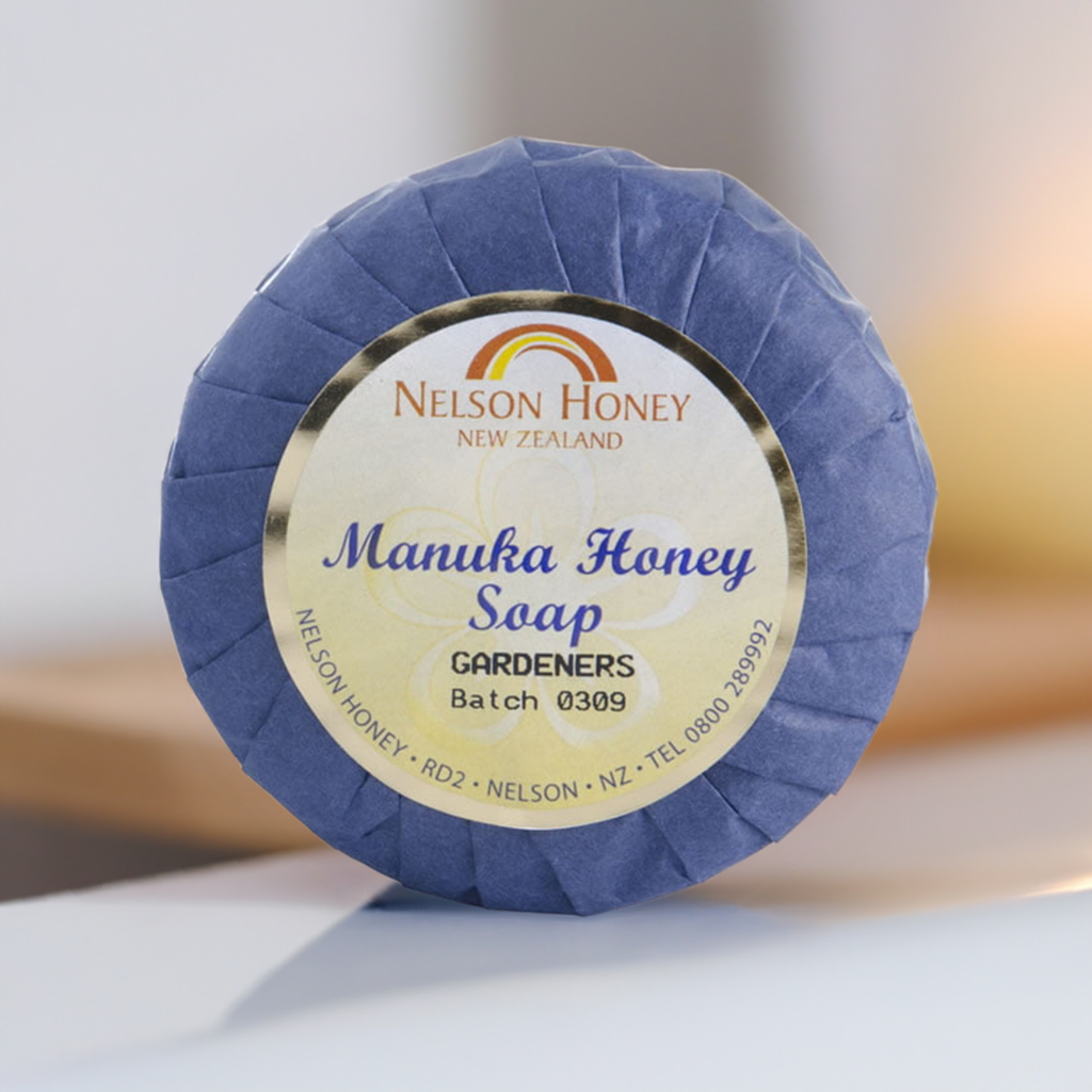 Nelsons Honey round wrapped bar labelled manuka honey gardeners soap in blue paper for hardworking hands