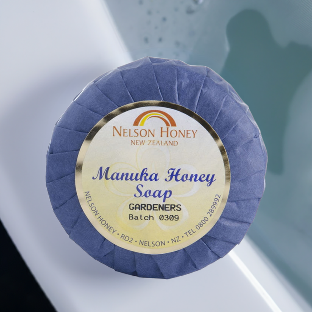 Nelsons Honey round bar manuka honey gardeners soap wrapped in purple paper with product label