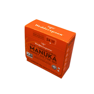 Wedderspoon Manuka honey snap packs box with 24 single-serve packets of raw monofloral honey on the go