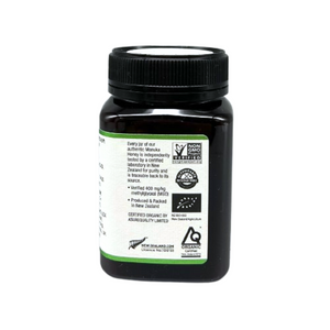 Wedderspoon Organic Raw Manuka Honey 400 MGO 500g jar showing certification labels and product details