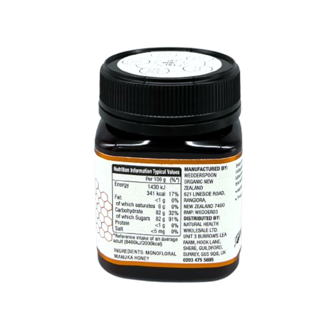 Wedderspoon Raw Manuka Honey 400 MGO 250g Unpasteurised in dark jar showing nutrition and manufacturing label