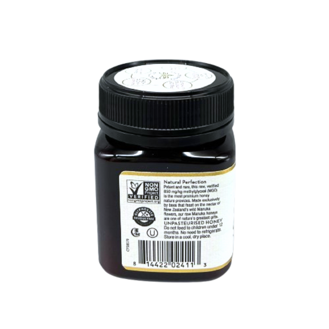 Wedderspoon Raw Manuka Honey 850 MGO 250g dark square jar with black lid and product label showing barcode