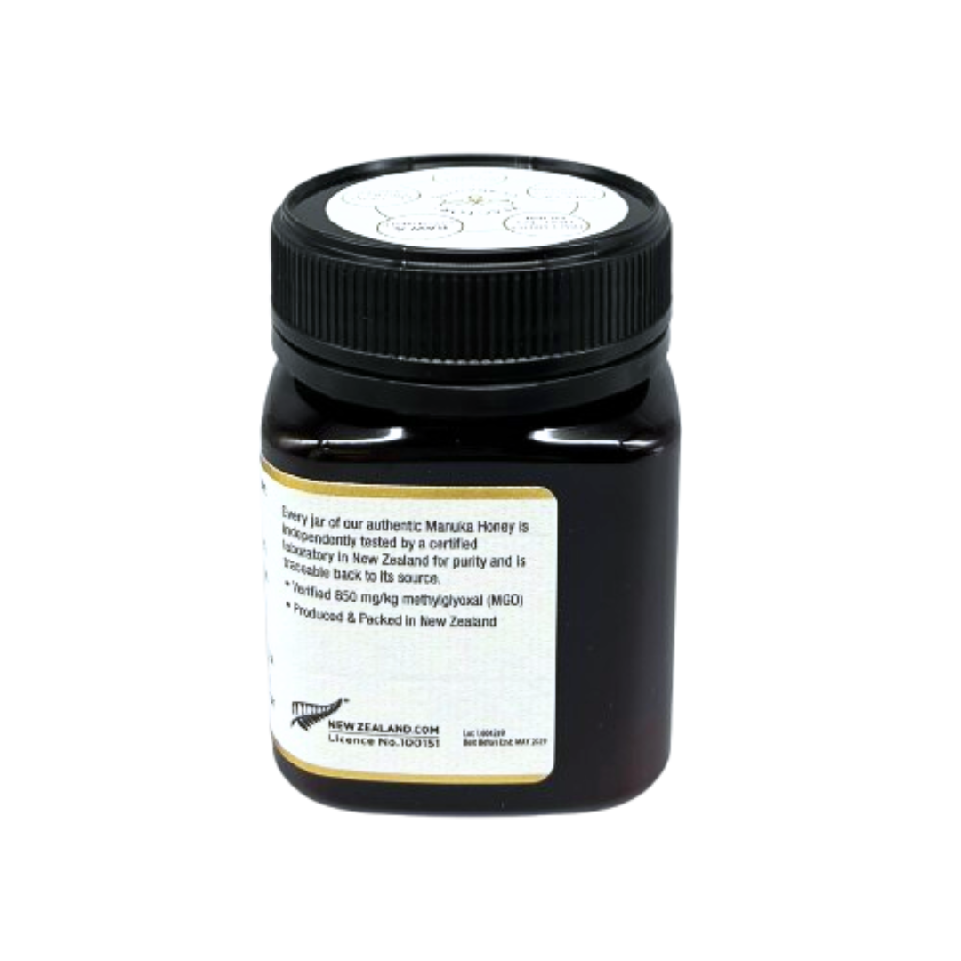 Wedderspoon Raw Manuka Honey 850 MGO 250g . dark plastic jar with black screw lid and white back label