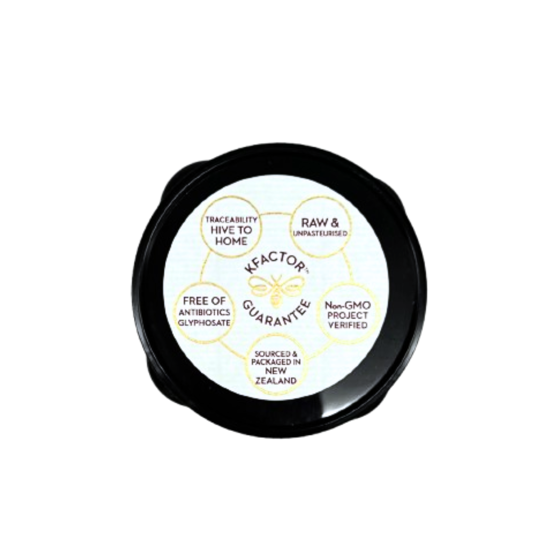 Wedderspoon Raw Manuka honey 850 MGO 500g jar lid with KFactor guarantee label stating raw unpasteurised non GMO