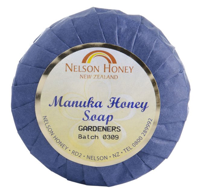 Nelsons Honey round wrapped bar labelled manuka honey gardeners soap in blue pleated paper packaging