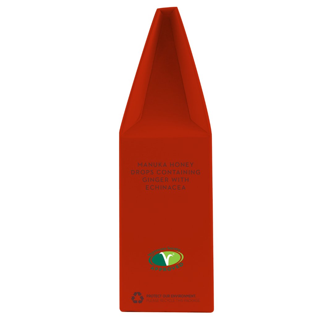 Wedderspoon manuka honey ginger drops throat lozenges in red packaging with natural ingredients